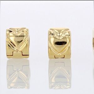 14K yellow gold Pandora heart clips.